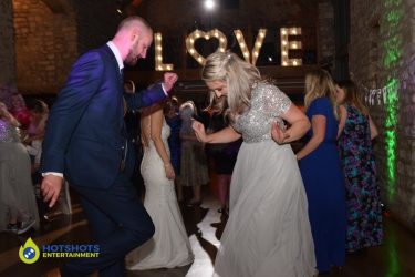 Bridesmaids dancing the night away at a wedding in Bath.