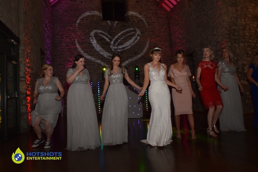 Bride and Bridesmaids doing a dance routine