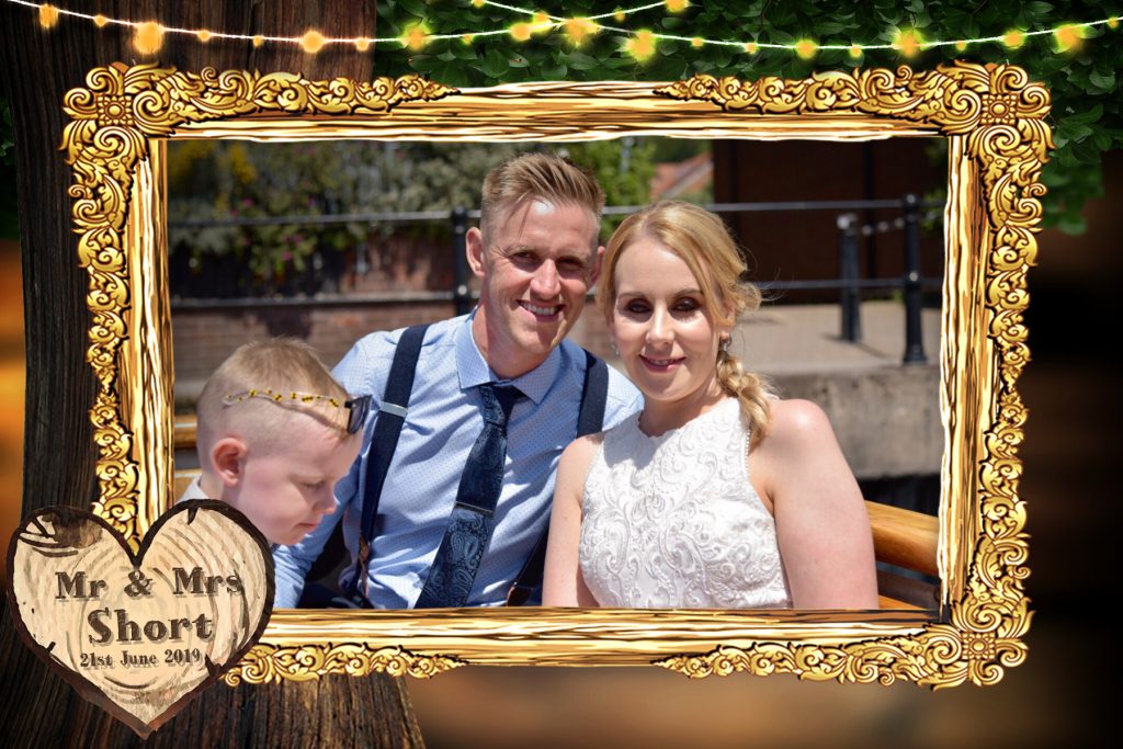 The Bride and Groom relaxing on the Bristol Harbourside, before going in for their first dance.