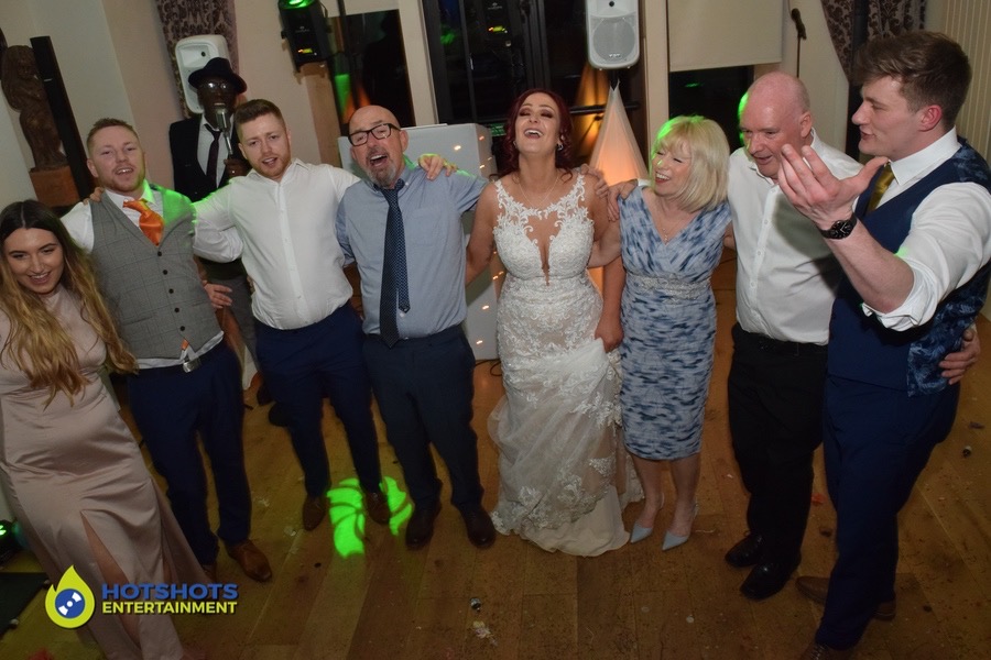Wedding guests singing along