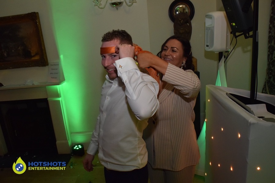 The groom being tied up